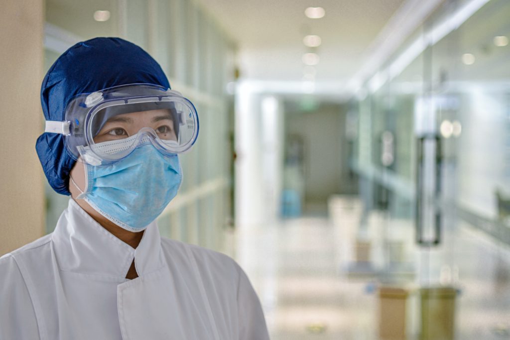 Individual wearing surgical face mask style